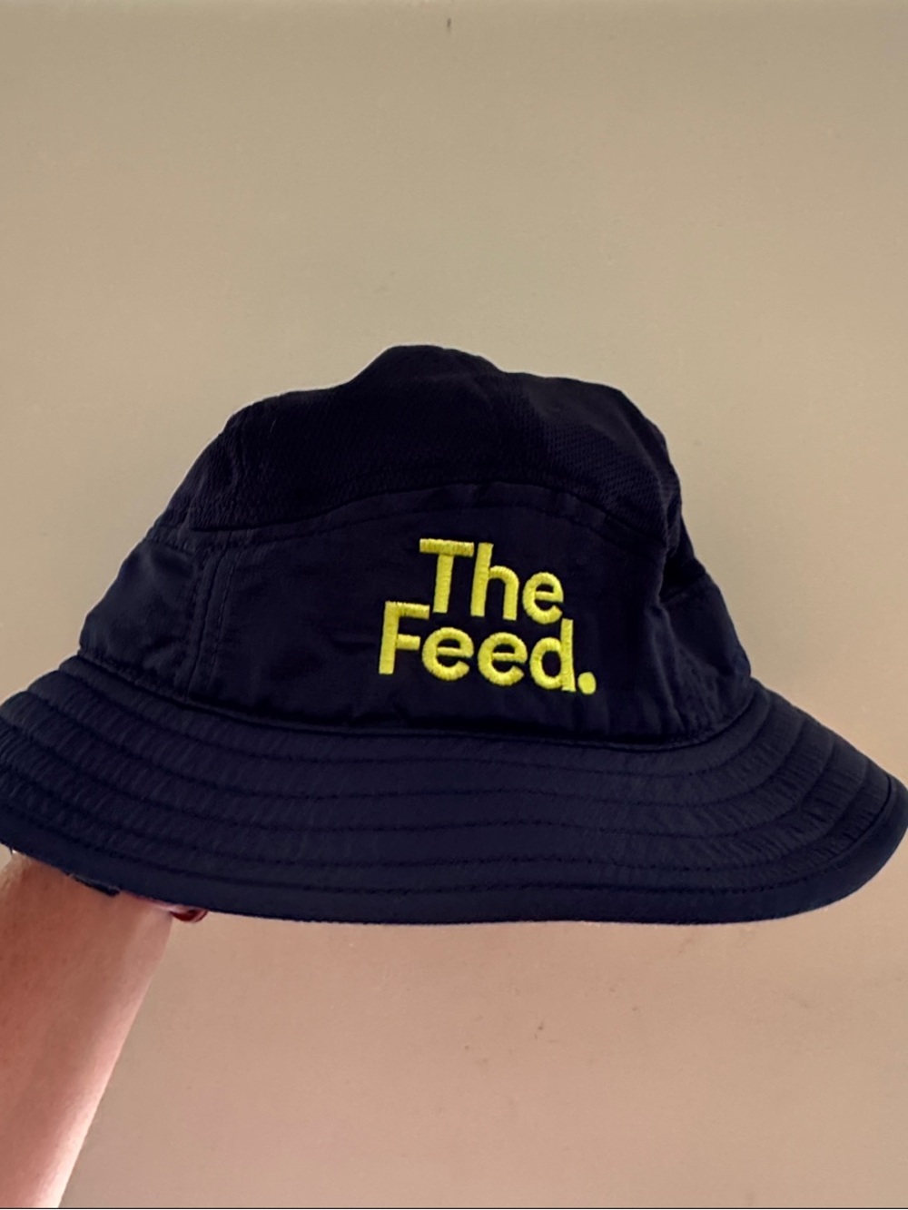 The Feed Adjustable Embroidered Navy Bucket Hat with Lime Green Logo